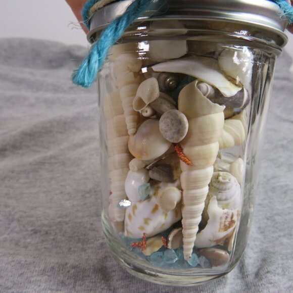 Jar of REAL sea shells and blue sparkly vase filler at bottom - Picture 6 of 9